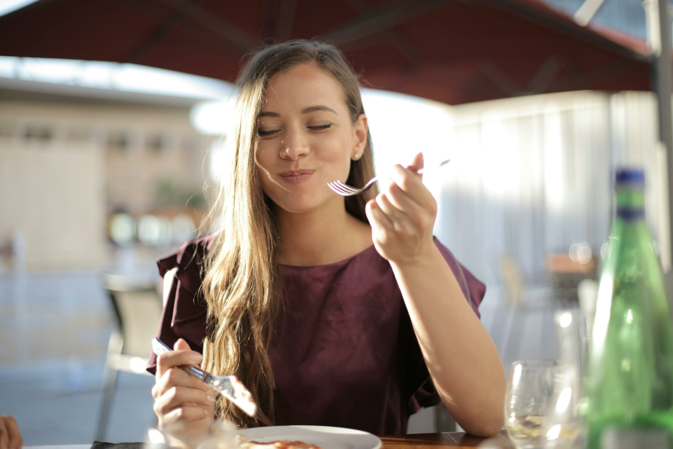 woman-eating-and-smiling